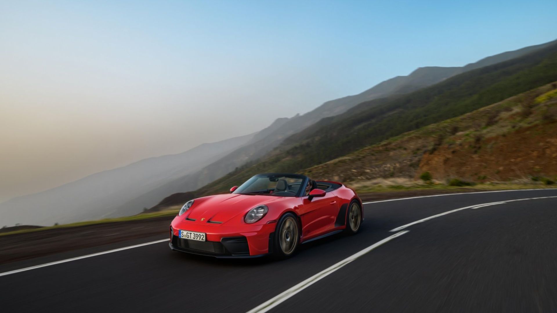 Photos: Porsche's new open-top sports car delivers 502 hp, hits 0-60 ...