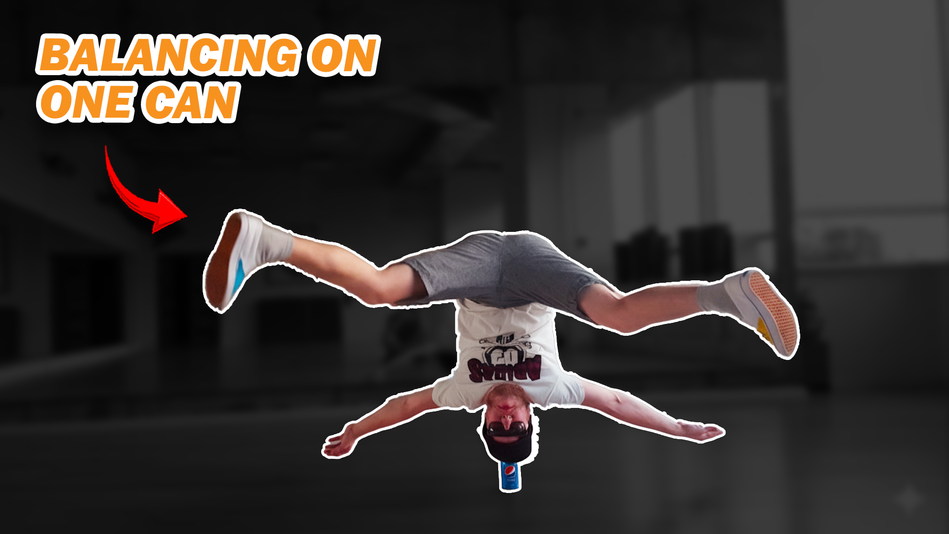 Man balances headstand on a single can