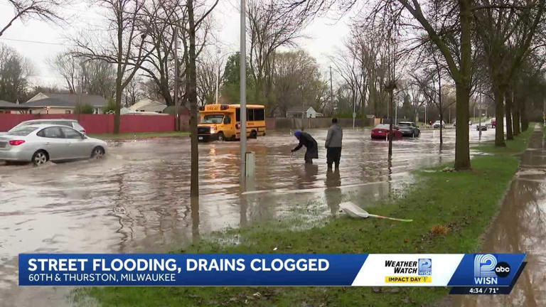 Milwaukee residents clear storm drains after flash flooding from severe ...