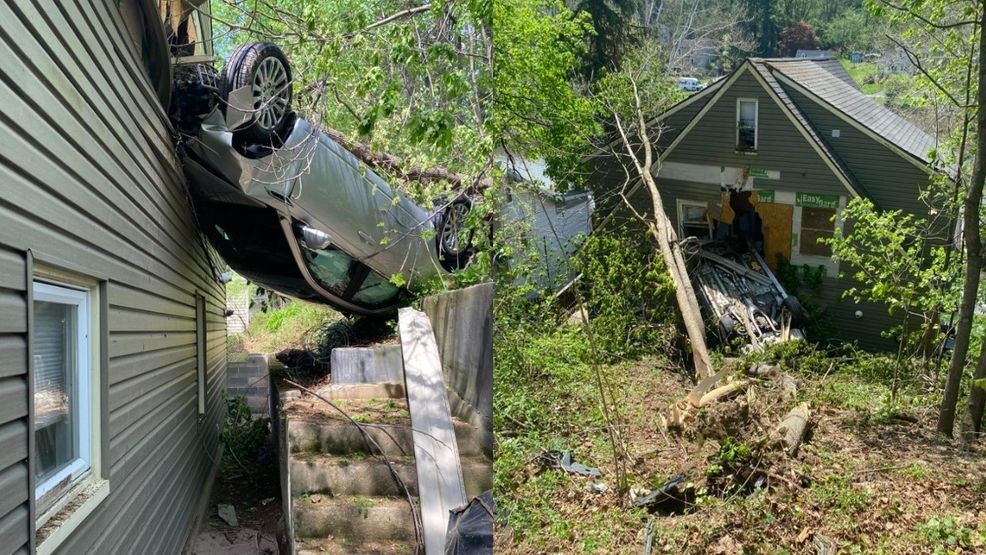 Car flips down embankment, lands on house in Cumberland County