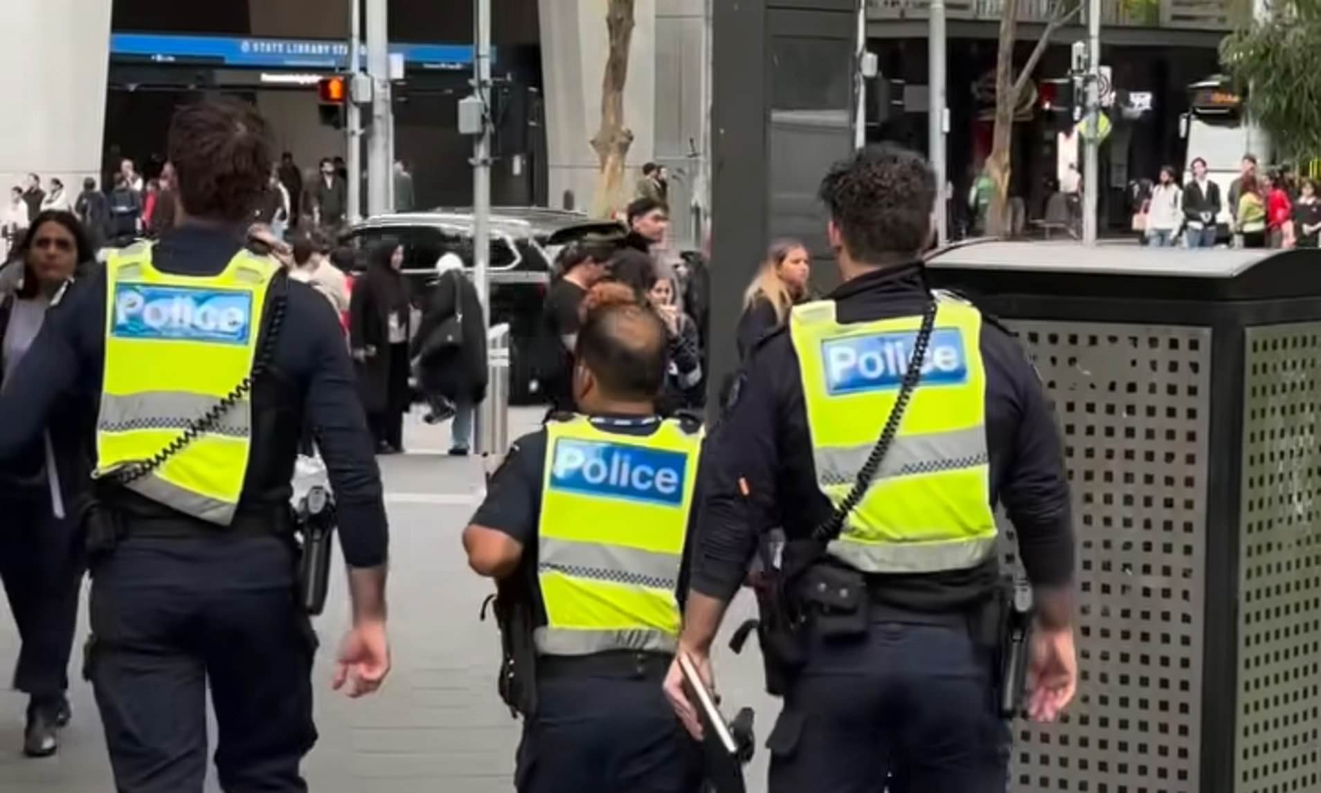 Why this photo of officers has sparked debate over a single detail ...