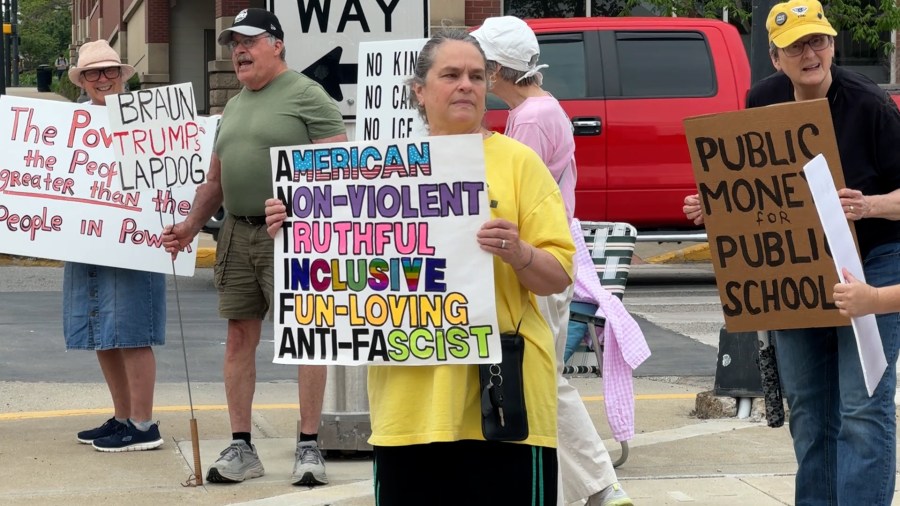 Community members rally against Indiana governor outside Hulman Center
