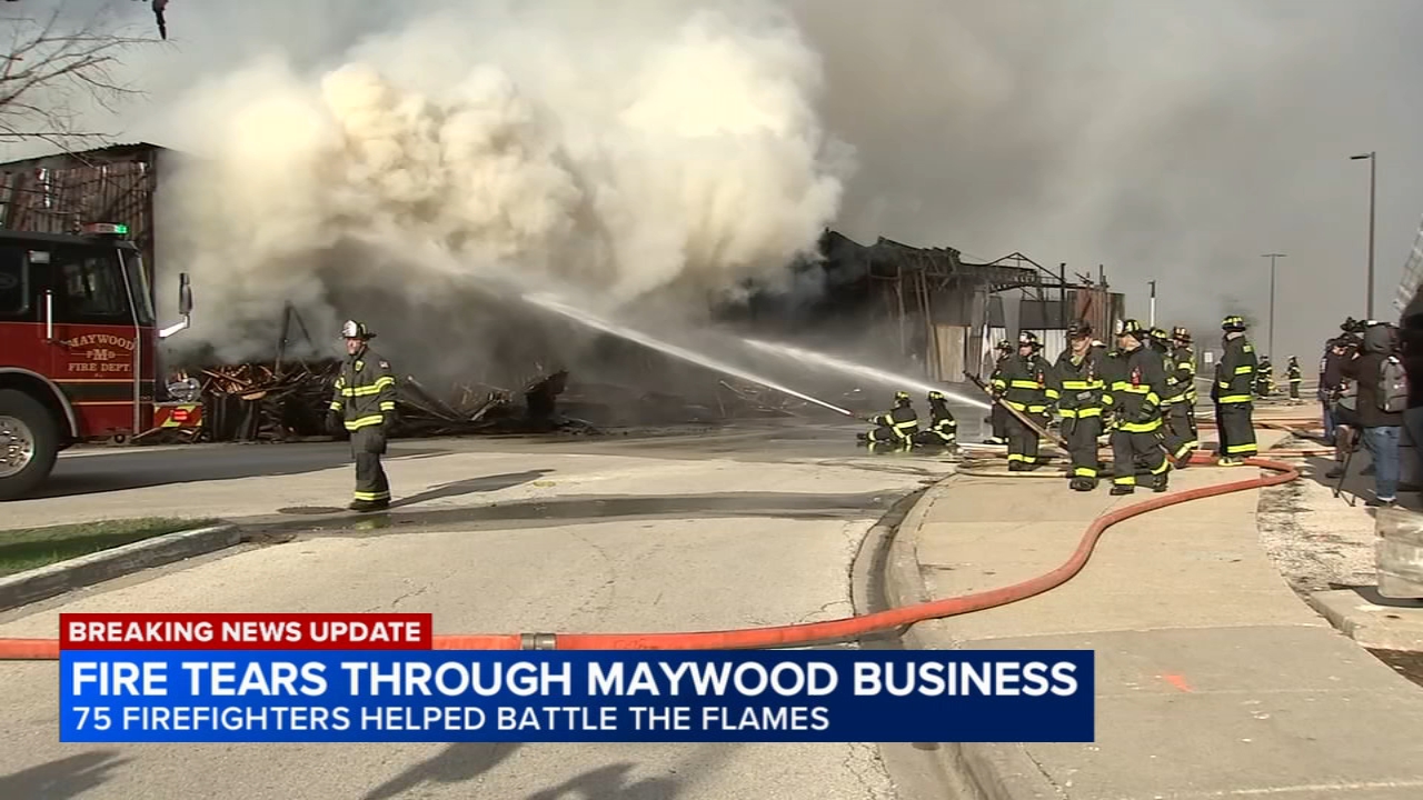 Firefighters battle large building fire at pallet company in Maywood ...