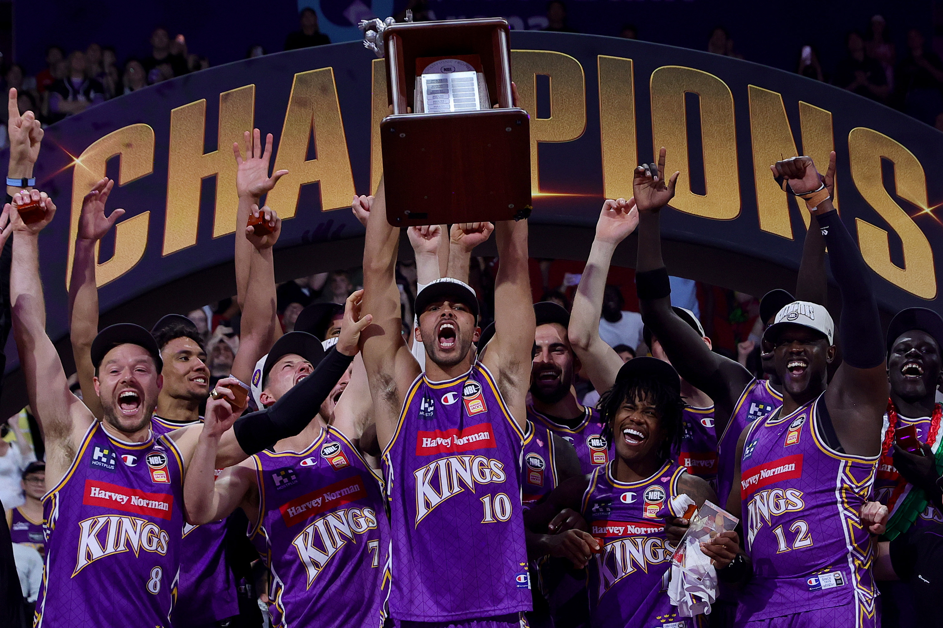 Kings seal overtime title as trophy breaks in celebrations