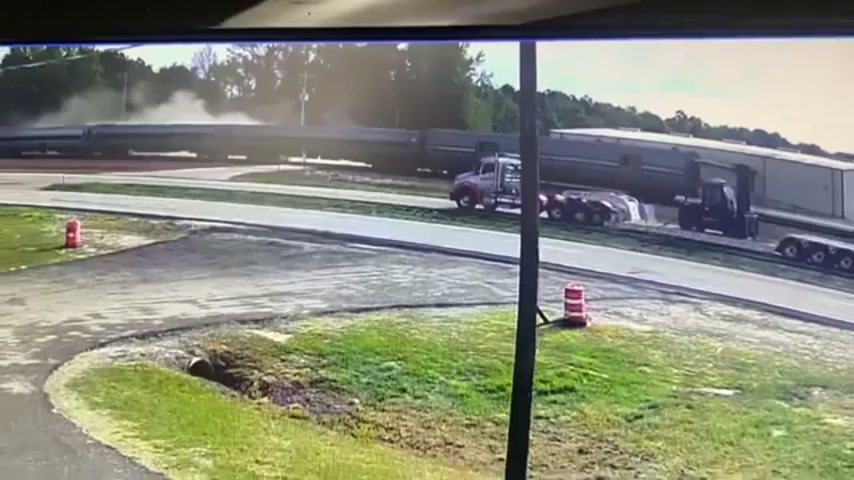 Amtrak train smashes into garbage truck in lucky escape for driver