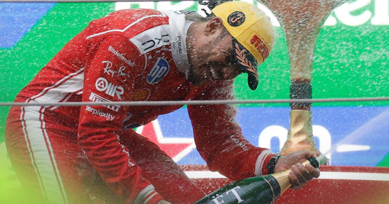 Lewis Hamilton celebrates his first Ferrari podium