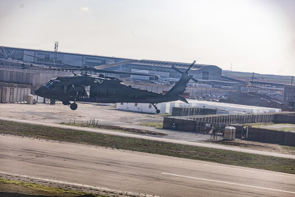 Worker for US defense contractor killed in Iraq as colleagues say they are pressured to stay<br>