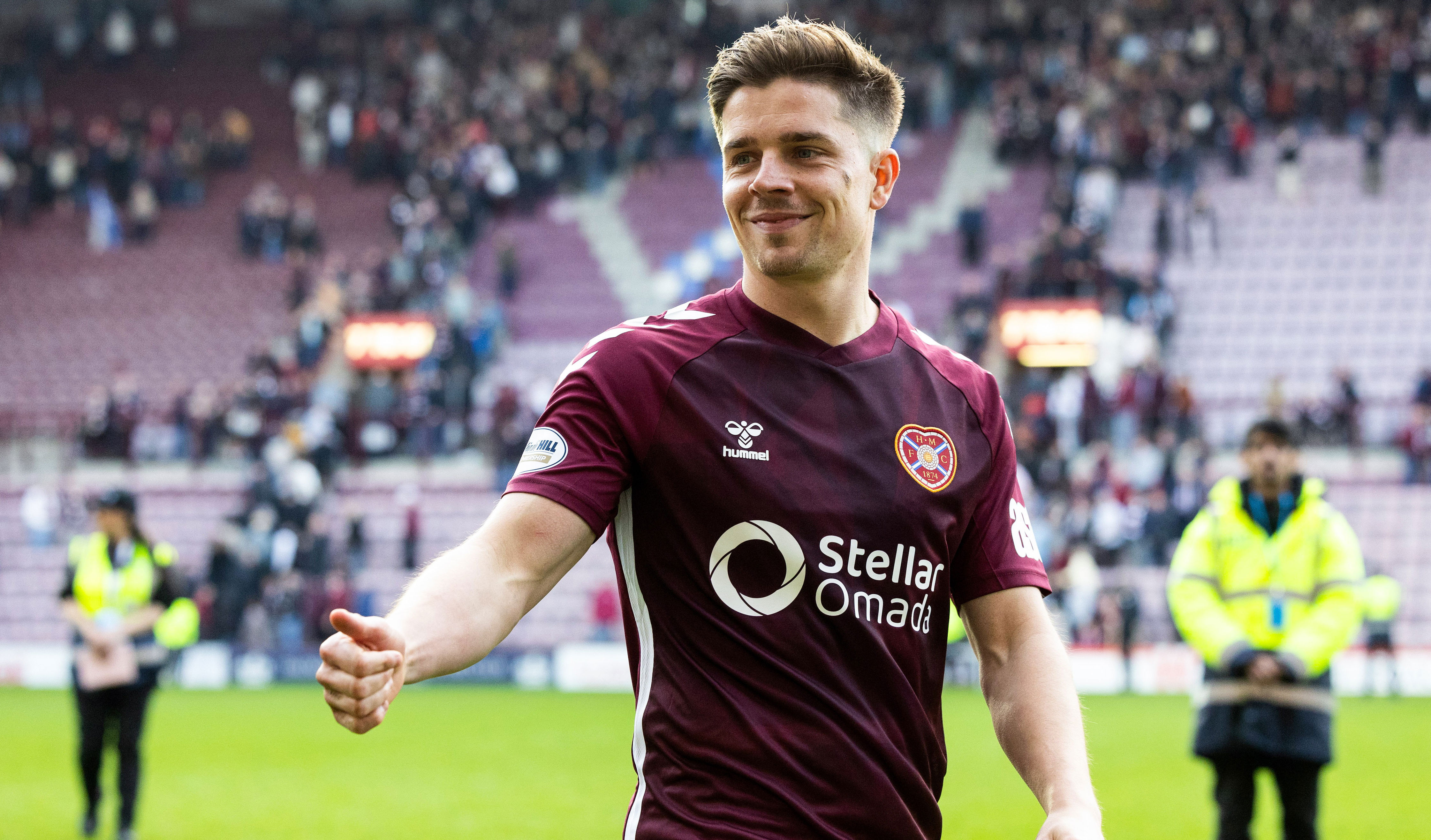 Cammy Devlin gets Rangers and Celtic bottle job taunts as Hearts fans ...