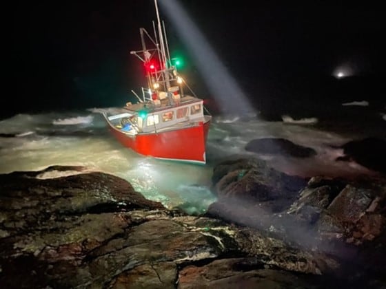 Two crew members rescued from boat after crashing into rocks in Gloucester