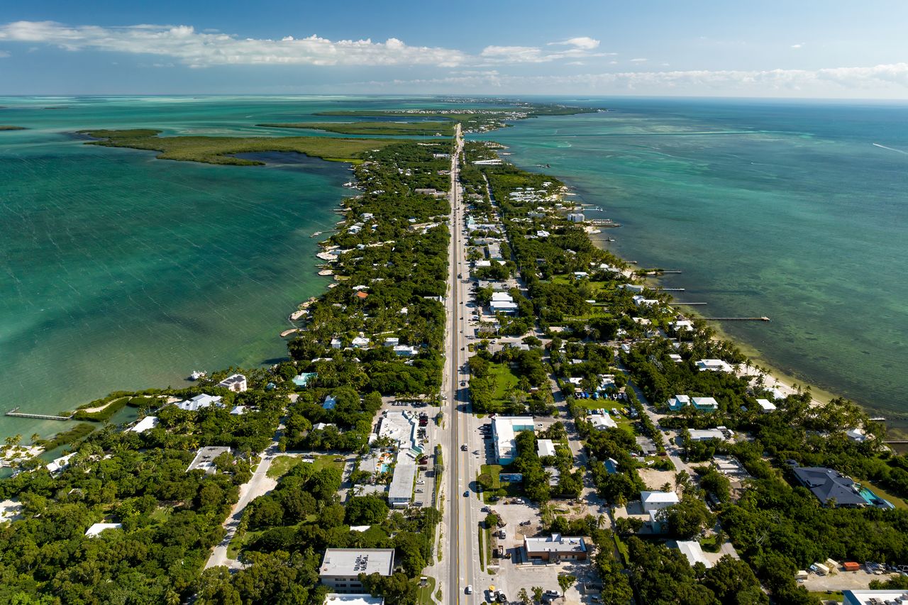 Aerial view of a road running through Islamorada Florida surrounded by water on both sides