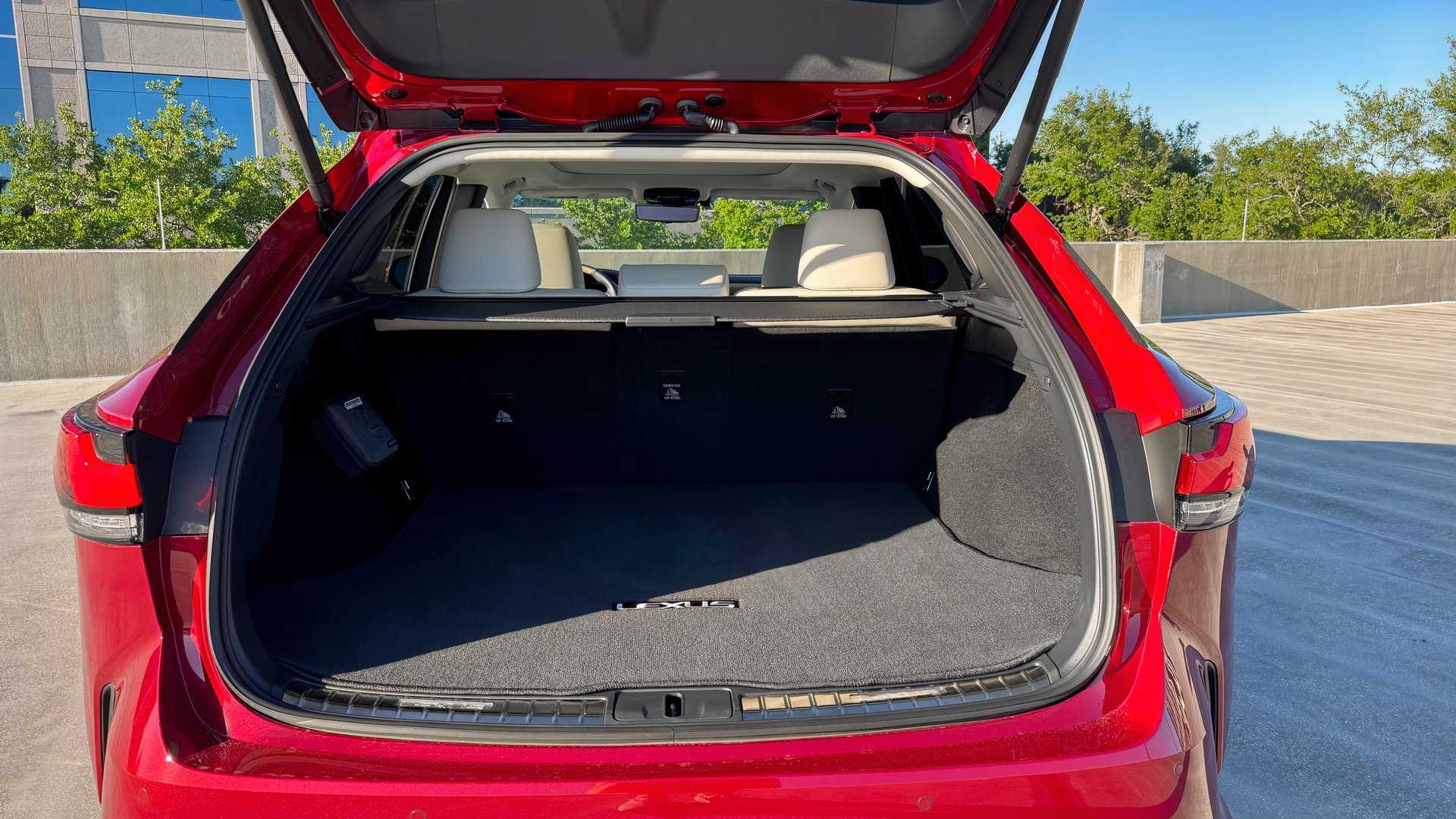 Shot of a red 2026 Lexus RX's cargo hold with rear seats up