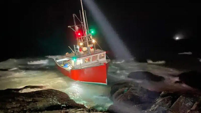Crew rescued after fishing boat gets stranded on rocks in Gloucester ...