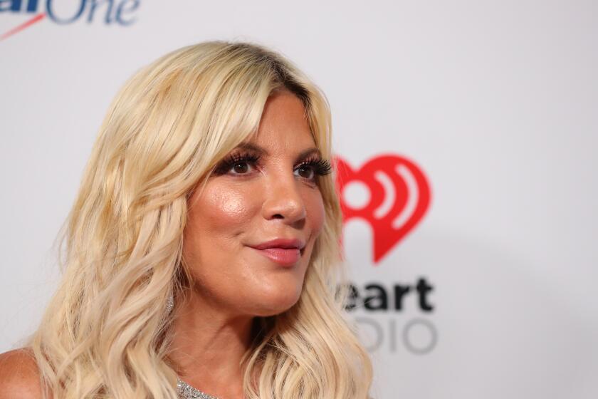Tori Spelling and four of her children injured in car crash<br>