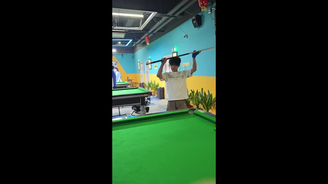 Billiard shot sends ball into trash bag instead of pocket in Guangdong ...