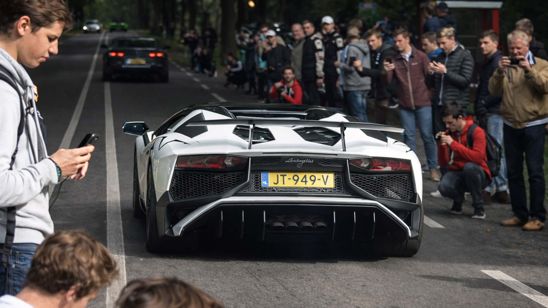 Full power exit from car meet ends in risky moment with crowd
