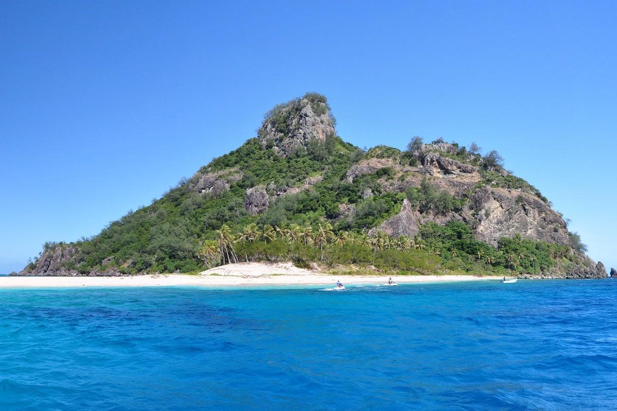 Passengers evacuated after cruise ship runs aground near island<br>