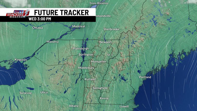 Cold and breezy with a few flurries through Tuesday
