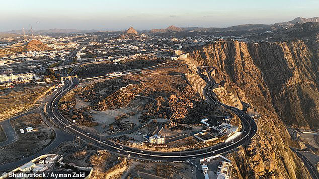 Mecca was previously deemed too hazardous for an airport due to its mountainous terrain, with many travellers forced to fly into Jeddah - 100km away - and travel into the city by car or bus (Pictured: Al Hada road to Mecca)