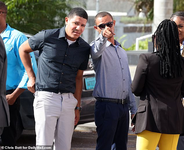 Lindsay was charged in the Bahamas with conspiring with her barman boyfriend Adrien Bethel (left) to have his childhood pal Faron Newbold Jr (right) 31, kill Robert