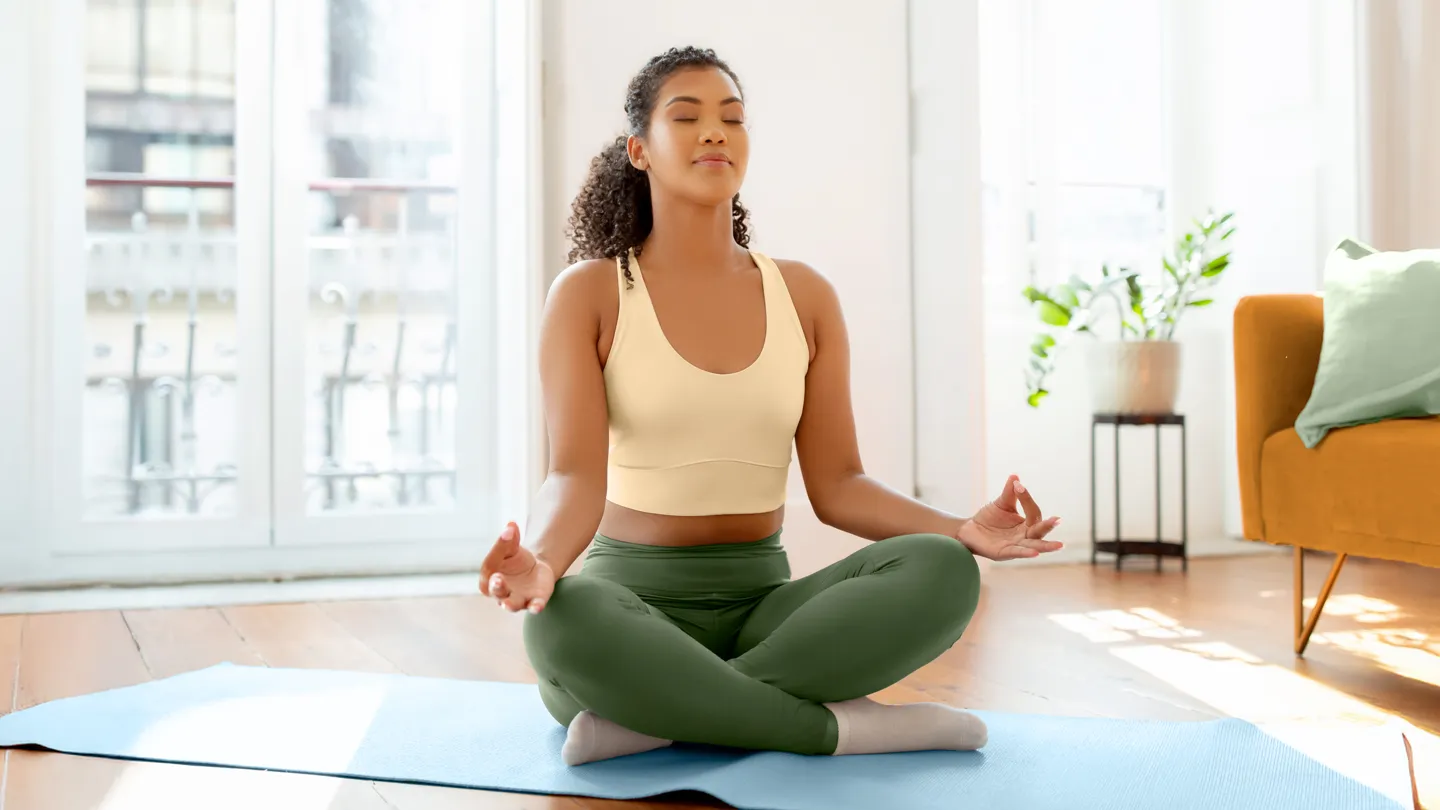 Can't sit cross-legged? Here's why, plus 4 exercises to get you there