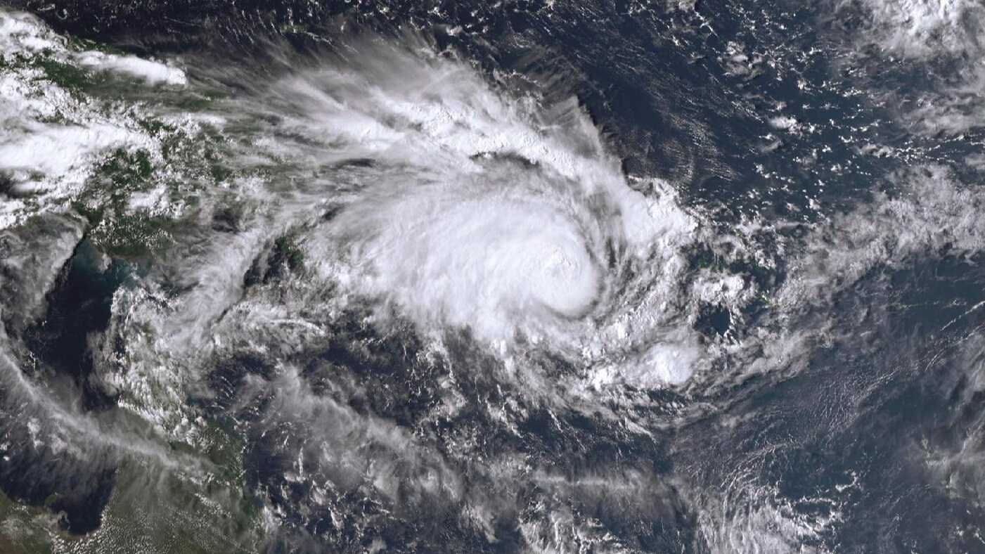 Cyclone Maila upgraded to category four as Queensland braces