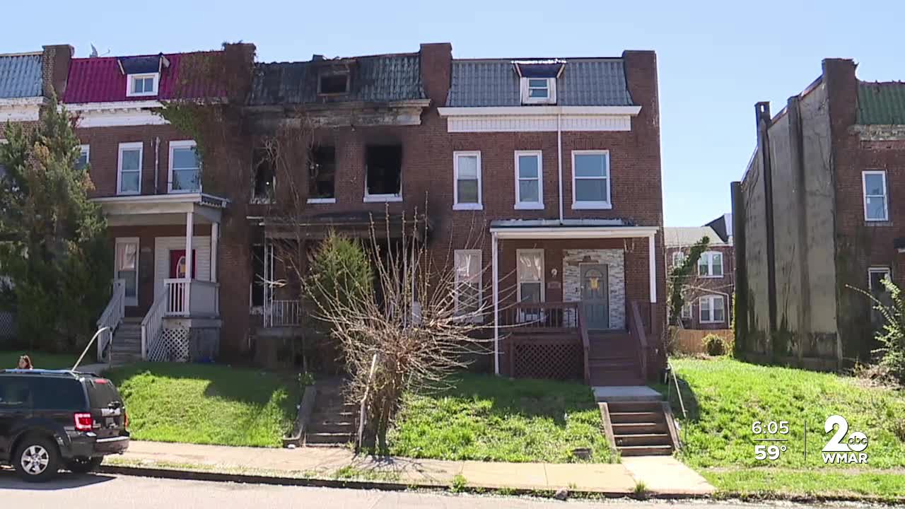 Family displaced following fire in neighboring vacant home