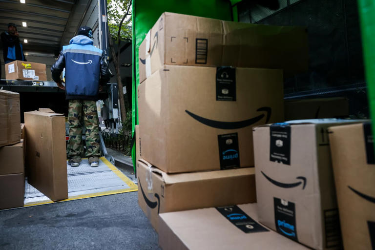 Amazon seals delivery deal with USPS. How UPS and FedEx shares are ...