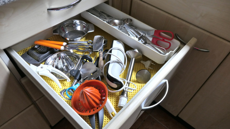 Curated visual reference: Visual Reference: Free Up Kitchen Drawer Space With A Creative Utensil Holder