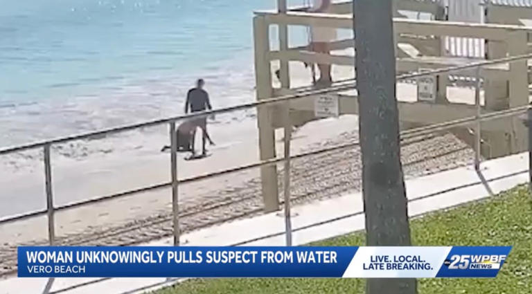 Woman leaps into action to save struggling swimmer — only to learn he’s ...