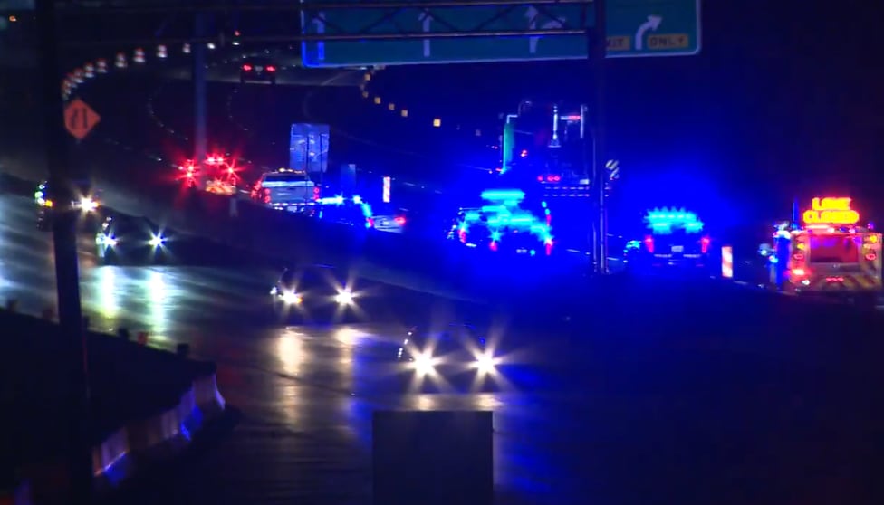Woman charged with murder after man found shot on I-285