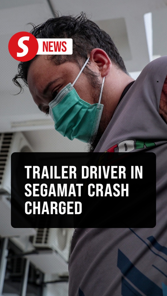 Trailer driver charged with murder of three in Segamat crash
