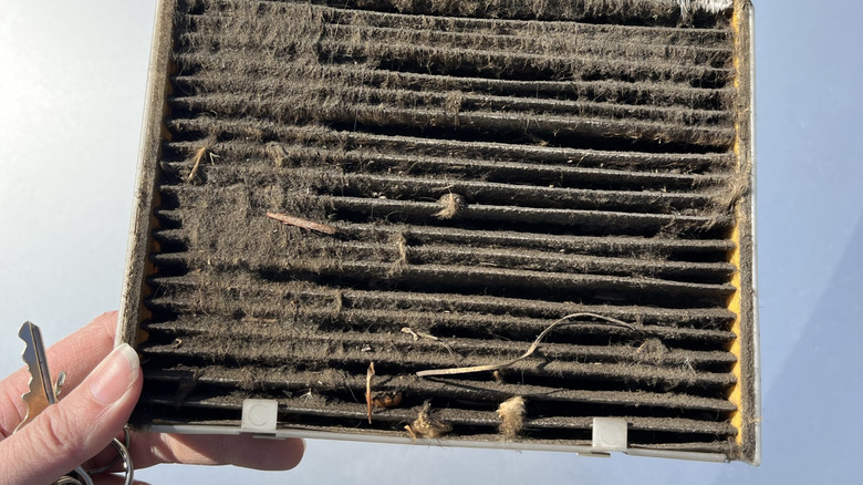 Watch this cabin air filter replacement process and feel rage well up ...
