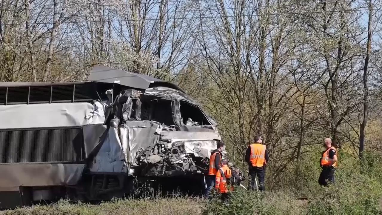 One killed and more than a dozen injured in train crash at level ...