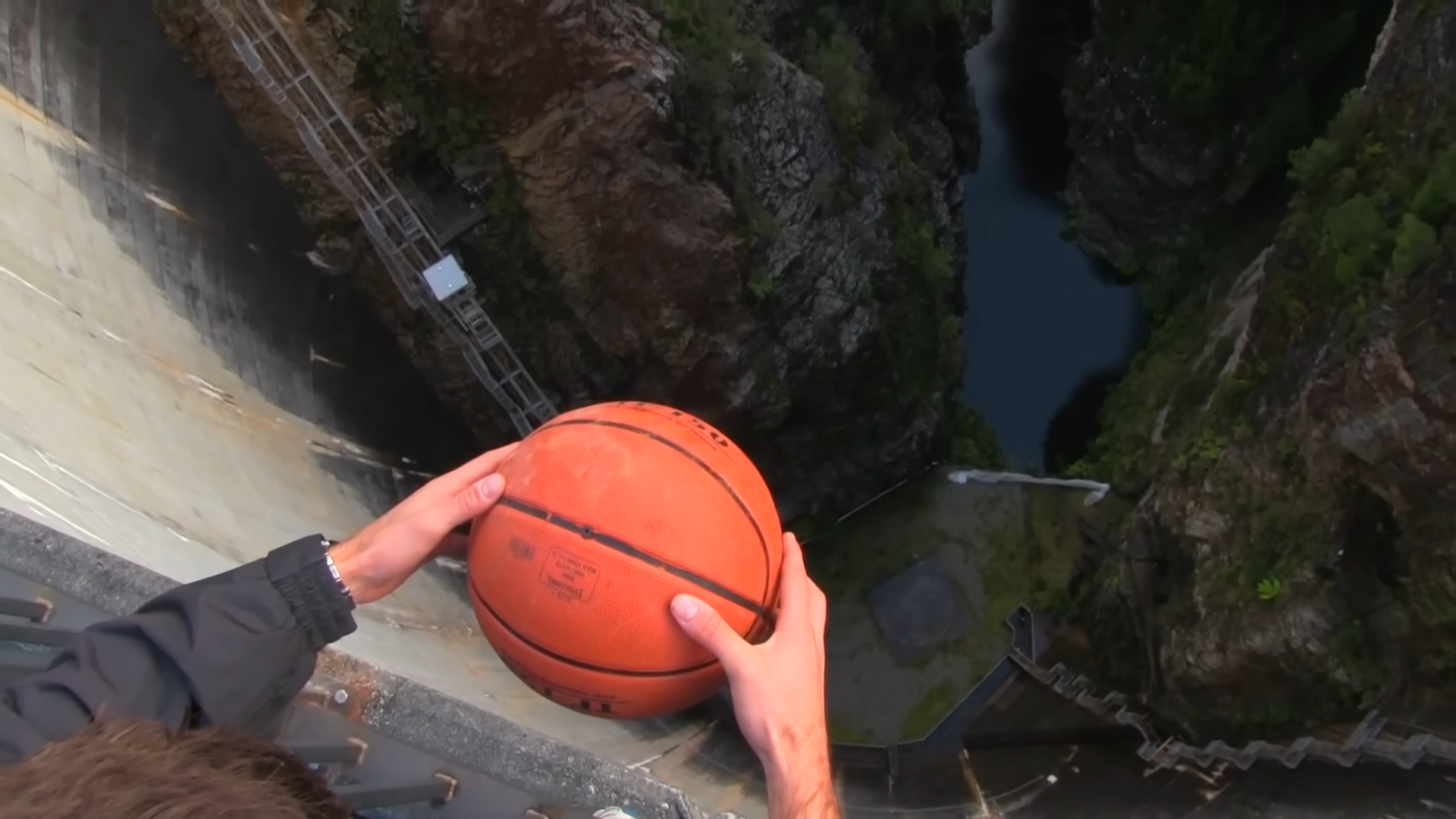 Watch this basketball fall off a 415-foot dam