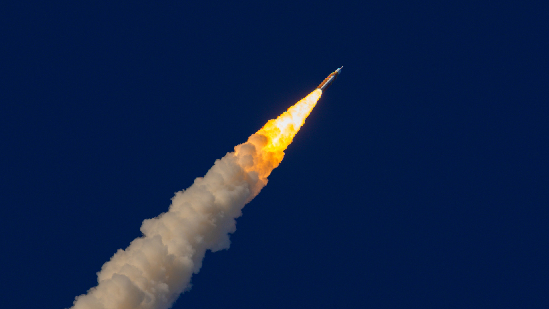 How exactly do you orbit the Earth, and what are the dangers of reentry?