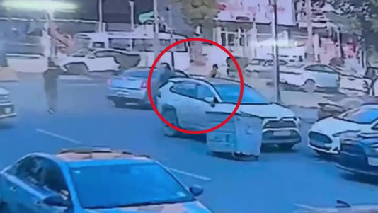 Surveillance footage appeared to show the moment Kittleson was kidnapped in Baghdad (AP)