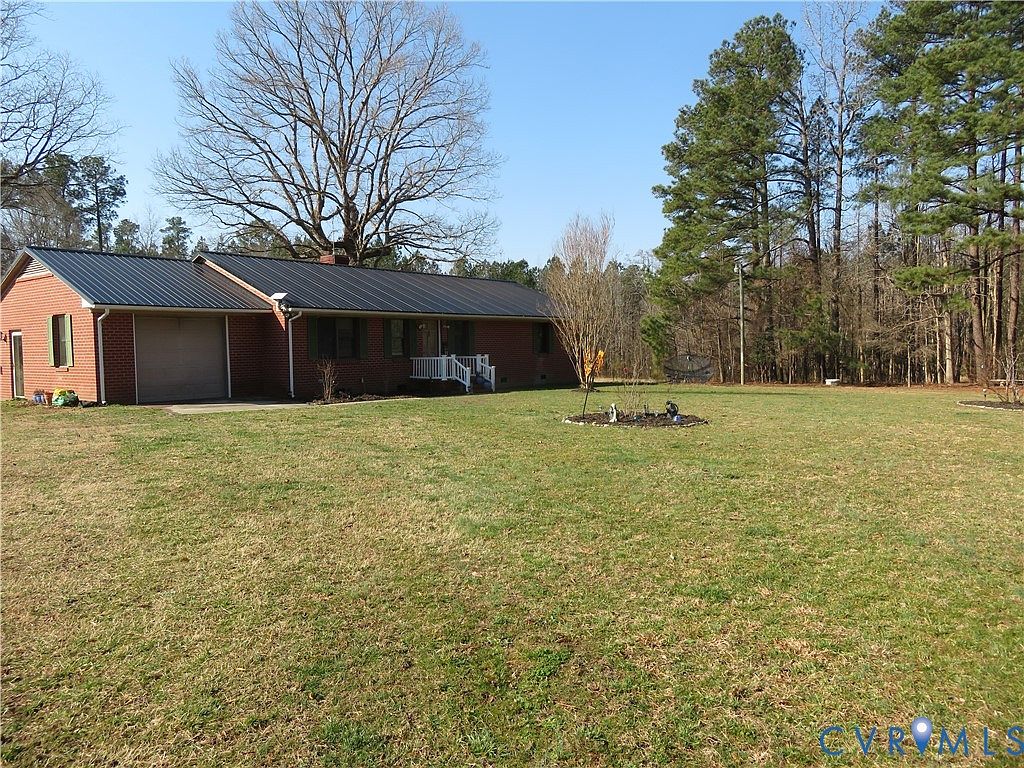 Charming 1986 all-brick ranch home in Freeman, Virginia, nestled on 2 ...