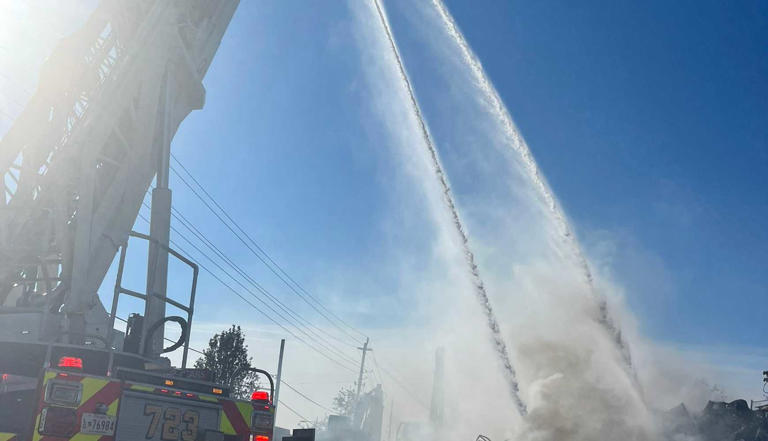 Towering flames, thick smoke shut down Maryland road during scrap yard ...
