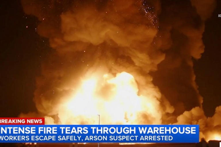 Massive arson fire engulfs California warehouse, sending flames and ...