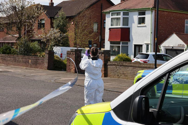 Police shout 'get inside' moments before armed officers shoot dog dead