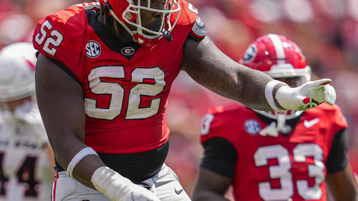 Georgia Bulldogs defensive lineman Christen Miller (52) reacts after making a tackle against the Ball State Cardinals during the second half at Sanford Stadium. | Dale Zanine-Imagn Images