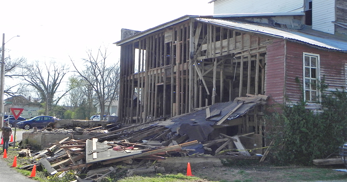 Section of old mill building being demolished in Houston