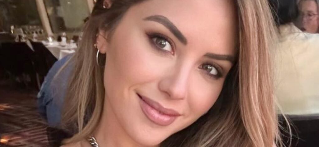 Brittney Palmer in skin-tight red dress is an 'angel in disguise'