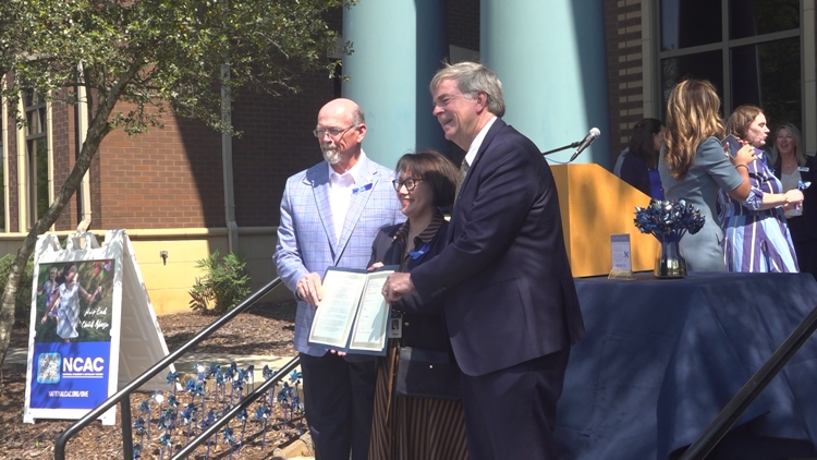 Madison County leaders honor NCAC's role in global child abuse prevention