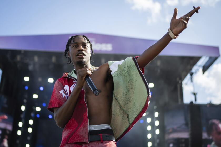 Rapper Lil Tjay arrested in Florida. Lawyer disputes connection to ...