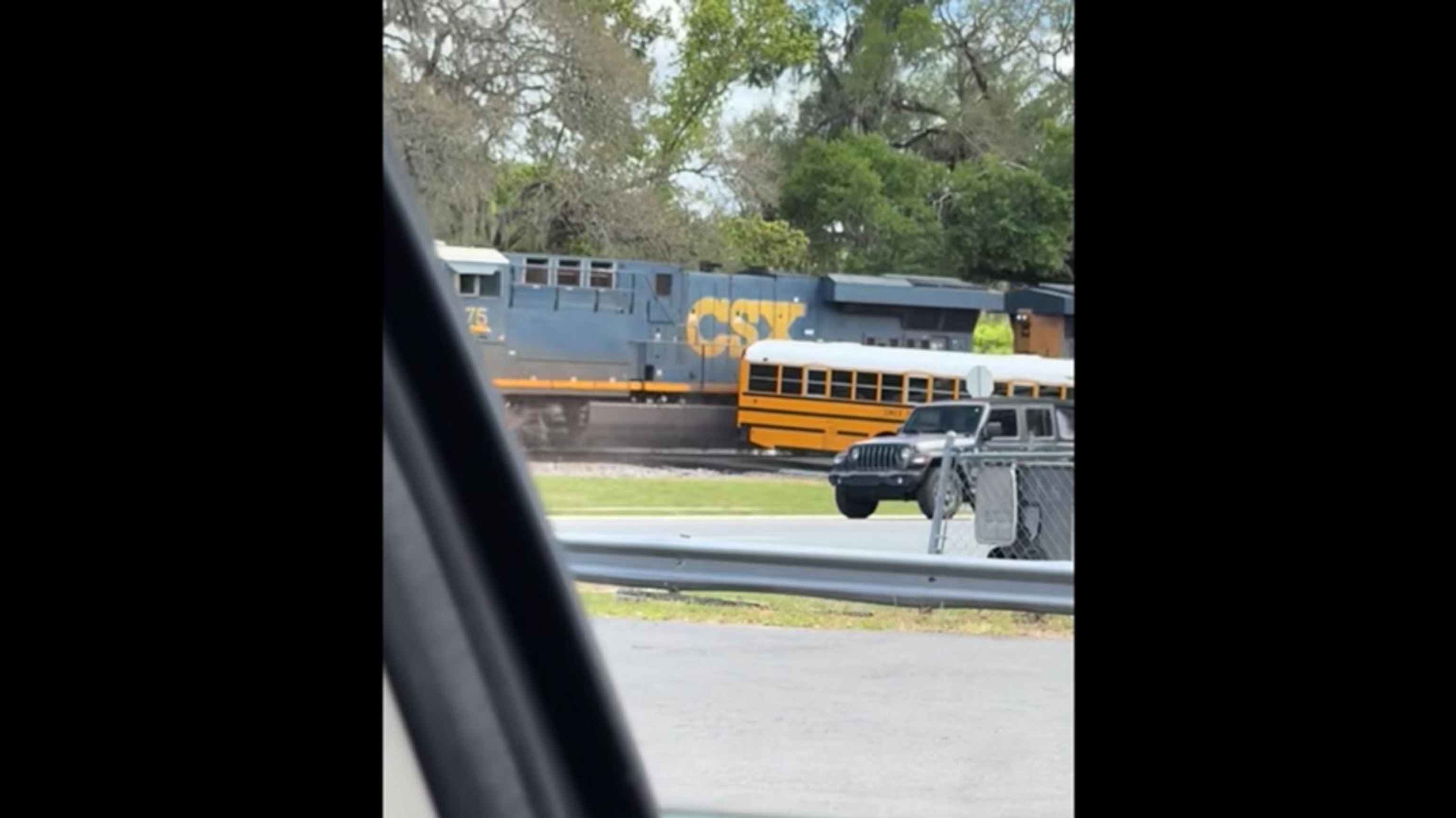 Florida school bus clipped by train with 29 students on board