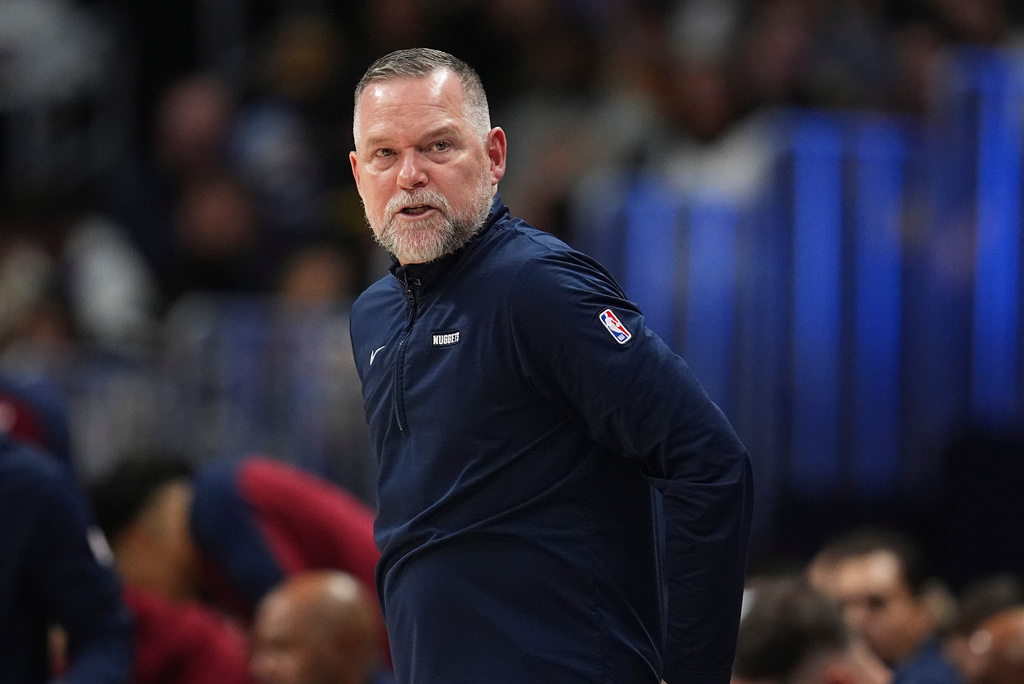 Michael Malone takes over at North Carolina as the Tar Heels turn to an outsider from the NBA