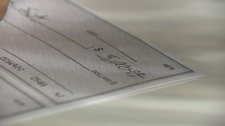 What is check washing? How to protect yourself from growing scam