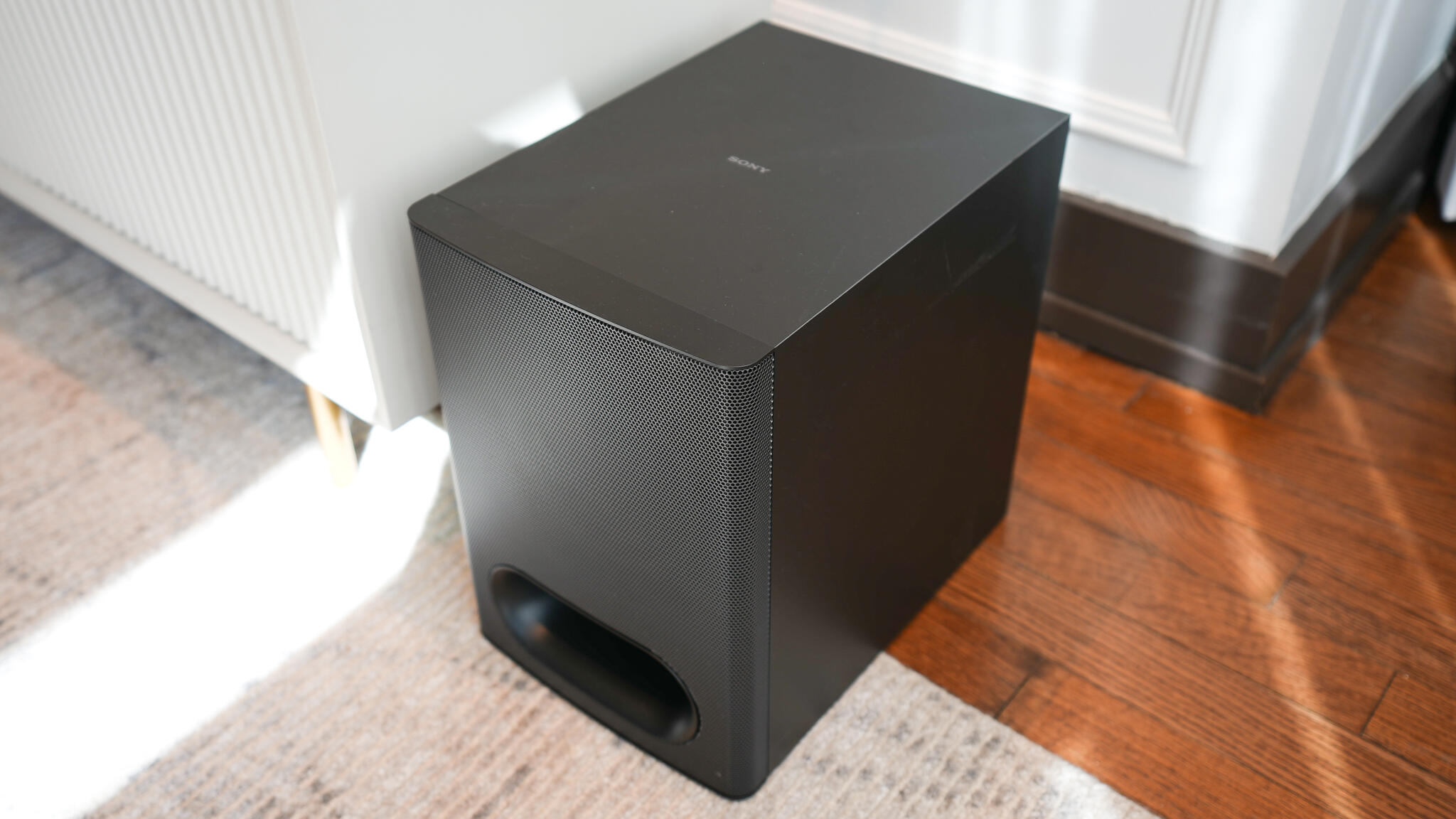 Why the 'Subwoofer Crawl' is the only way I found the bass sweet spot in my living room