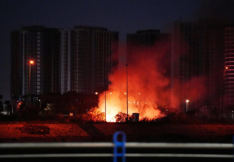 Smoke and flames rise near the US Embassy compound after a suicide drone attack in Baghdad on 17 March (Photo: Murtadha Al-Sudani/Anadolu)